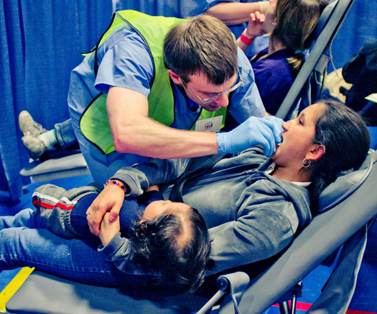 women undergoes dental proceedure