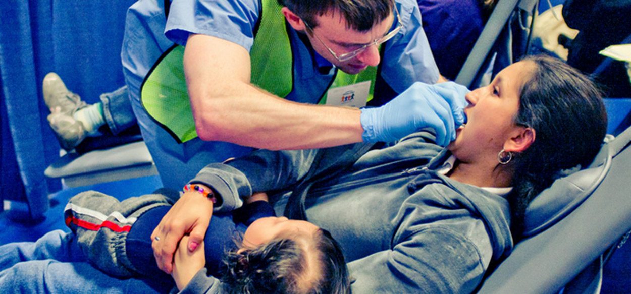 women undergoes dental proceedure