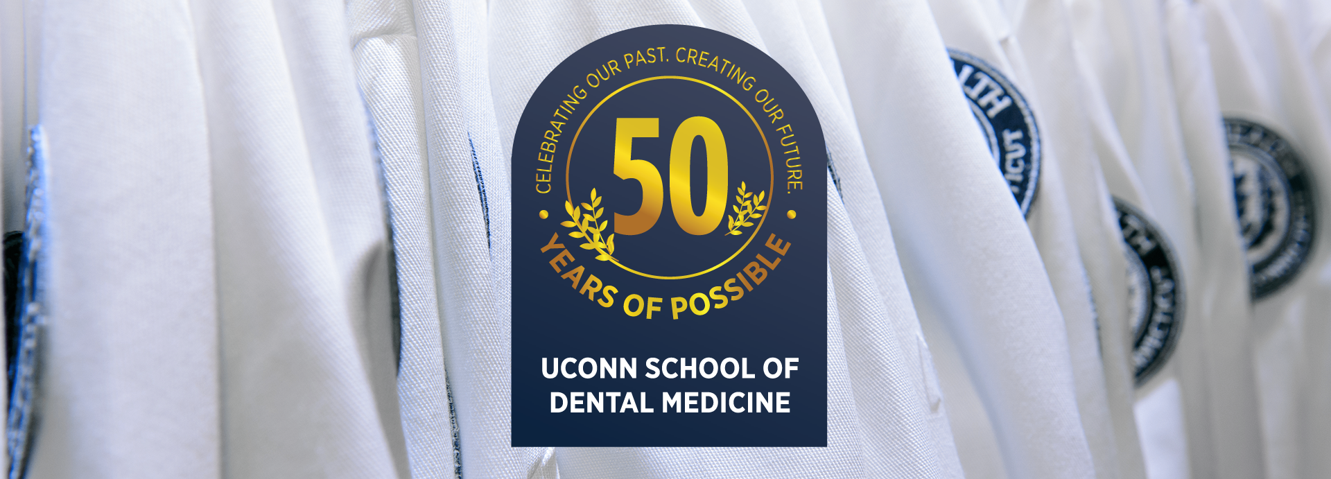 slides-dental UConn School of Medicine 50 Years of Possible Seal overtop white coats